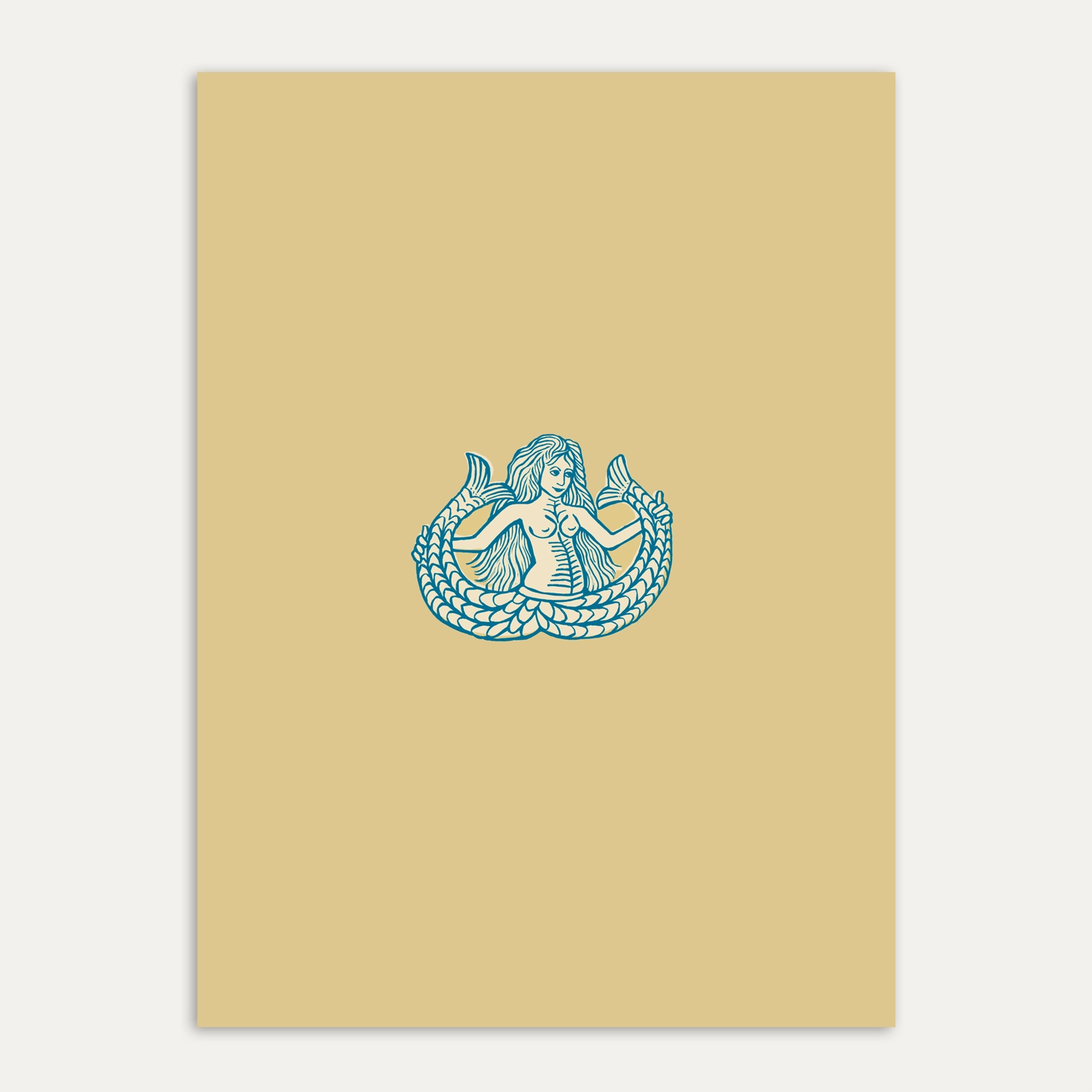 Still-life del Quaderno Ondina con copertina beige ispirata al mito della sirena bicaudata